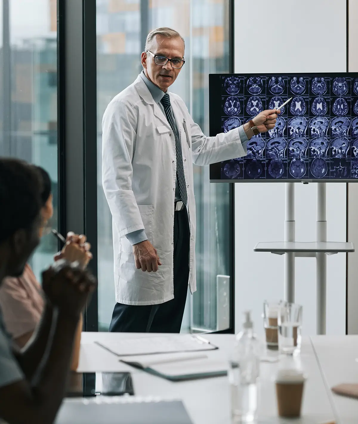 mature-doctor-presenting-at-medical-conference-2026-01-08-07-55-30-utc (1)